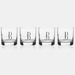 Eleganter dekorativer monogrammatischer Buchstabe  Whiskyglas