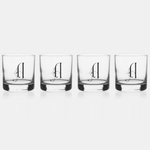 Eleganter dekorativer monogrammatischer Buchstabe  Whiskyglas