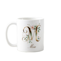 Eleganter Gold-Blumen-Initiale M-Monogramm-Becher