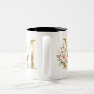 Eleganter Gold-Monogramm-M-Becher Zweifarbige Tasse