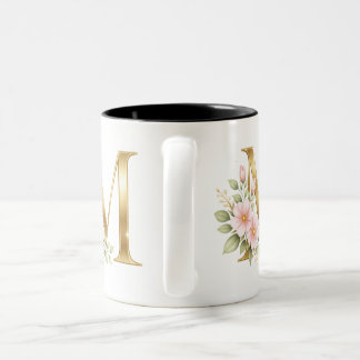 Eleganter Gold-Monogramm-M-Becher Zweifarbige Tasse
