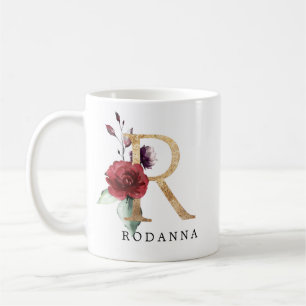 Eleganter goldener Blush-Rosa-Blumenbuchstabe R Kaffeetasse
