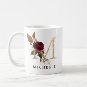 Eleganter Goldschmied und Blush-Blume Letter M Kaffeetasse