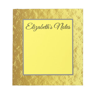 Eleganter, individualisierbarer Text auf goldenen Notizblock