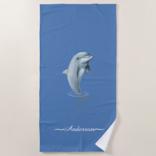 Eleganter moderner Delfin und Schrift auf wundervo Strandtuch