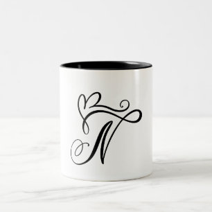 ELEGANTER MONOGRAMM FARBSCHWARZSCHREIBEN "N" ZWEIFARBIGE TASSE
