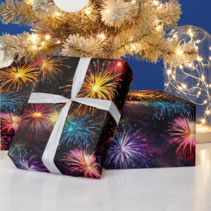 Eleganter Regenbogenfeuerwerk auf schwarzem Hinter Geschenkpapier