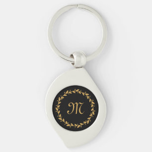 Eleganter Schwarz-Gold-Kranz und Monogramm-Initial Schlüsselanhänger