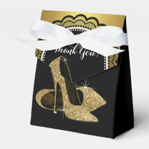 Eleganter schwarzer High Heel-Schuh mit goldenen G Geschenkschachtel