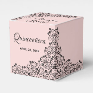 Eleganter schwarzer Wirbel errötet an rosa Geschenkschachtel