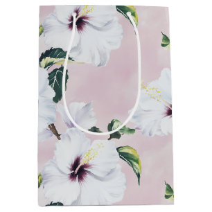 Eleganter weißer Hibiskus auf weichrosa Hintergrun Mittlere Geschenktüte