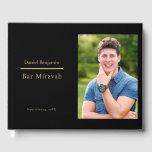 Elegantes Black Gold Foto Bar Mitzvah Gästebuch<br><div class="desc">Ein elegantes und schlichtes Gästebuchdesign mit Platz für Ihr Lieblings-Foto,  auf einem soliden schwarzen Hintergrund mit goldfarbenem Text. Personalisiert mit Text auf der Wirbelsäule. Zurück ist schwarz.</div>