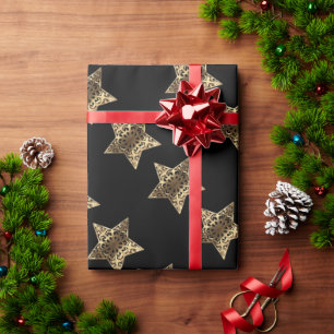 Elegantes Black Gold Look Weihnachtsstars Muster Geschenkpapier