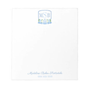 Elegantes blaues Wasserzeichen-Monogramm-Wappen fü Notizblock
