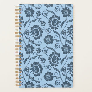 Elegantes Blumenmuster auf hellblauem Hintergrund Planer