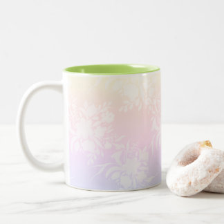 Elegantes Blumenmuster in Pastellfarben Zweifarbige Tasse
