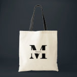 Elegantes einfaches, modernes Schwarzes Personalis Tragetasche<br><div class="desc">Diese elegante und moderne schwarze Tasche ist das ultimative Accessoire für jedes Party oder jede Brautjungfrau. Das elegante, minimalistische Design ist perfekt für jeden Anlass. Die ausgeklügelte schwarze Farbe strahlt zeitlose Eleganz aus, während das personalisierte Monogramm Name Initial eine Touch von Individualität und Charme verleiht. Diese Tasche ist ideal, um...</div>