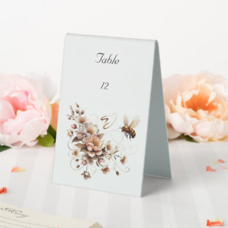 Elegantes Gebäck und Blumenzelt Tischaufsteller