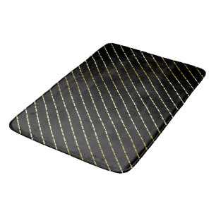 Elegantes geometrisches Goldenes Muster auf schwar Badematte