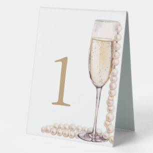 Elegantes Gold Perlen und Prosecco Brautparty Tischaufsteller