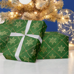 Elegantes grünes Schneeflockenmuster mit goldenen  Geschenkpapier