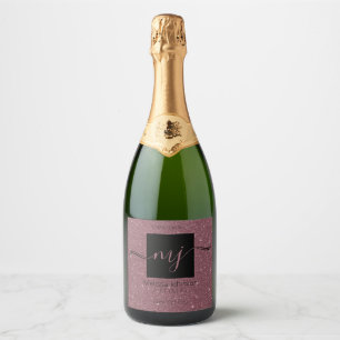 Elegantes Roségold auf schwarzem funkelnden Weinla