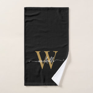Elegantes Schwarz-Gold-Monogramm im stilvollen Skr Handtuch