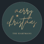Elegantes Script Merry Christmas Gold Star Dark Aq Runder Aufkleber<br><div class="desc">Diese stilvollen Weihnachtsaufkleber sind mit elegantem Typografie-Lesen,  "Frohe Weihnachten" in den Imitaten goldenen Folie,  zusammen mit einem kleinen Star-Akzent. Die Hintergrundfarbe kann auf jede gewünschte Farbe angepasst werden! Ideal für Umschlag Aufkleber,  Gastgeschenk-Etiketten oder Geschenkaufkleber!</div>