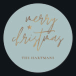 Elegantes Script Merry Christmas Gold Star Lite Aq Runder Aufkleber<br><div class="desc">Diese stilvollen Weihnachtsaufkleber sind mit elegantem Typografie-Lesen,  "Frohe Weihnachten" in den Imitaten goldenen Folie,  zusammen mit einem kleinen Star-Akzent. Die Hintergrundfarbe kann auf jede gewünschte Farbe angepasst werden! Ideal für Umschlag Aufkleber,  Gastgeschenk-Etiketten oder Geschenkaufkleber!</div>