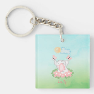 Eléphant mignon bébé avec fleurs roses