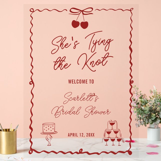 Elle Attache le Nœud Bienvenue à la Soirée de Mari (Celebrate with this clear acrylic and red "She’s Tying the Knot" chic bridal shower welcome sign)