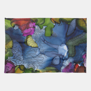 Elle coule la serviette de cuisine