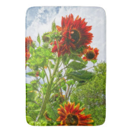 Émeraudes et tapis de bain de tournesol du feu