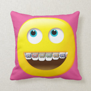 Emoji avec le coussin de croisillons