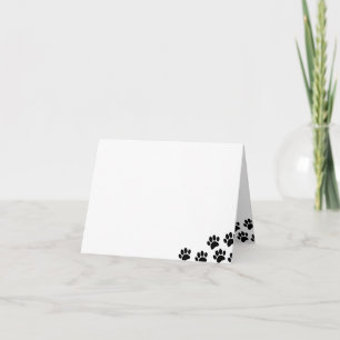 Empreintes de patte de chiot noir Vide