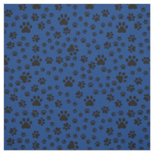 Empreintes de pattes noirs sur tissu bleu royal
