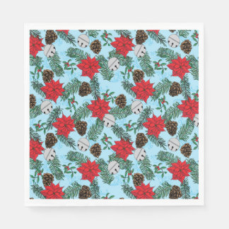 En Papier Poinsettias et cloches d'argent dans les serviette