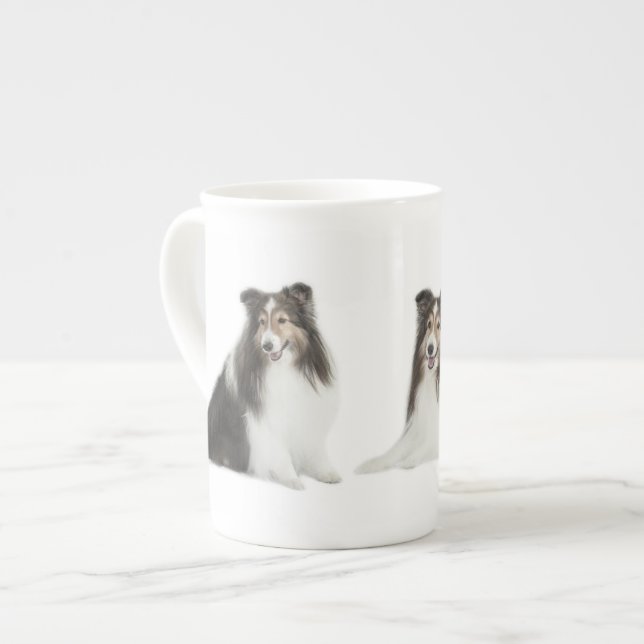 En Porcelaine Mélange de Sheltie et tasse de match (Devant gauche)