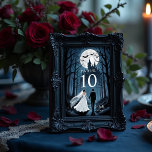 Enchanted Gothic Spooky Wedding Couple Forest Tischnummer<br><div class="desc">Enchanted Gothic Spooky Wedding Couple Forest and Haunted Castle Table Numbers. These table cards evoke a magical and mysterious atmosphere, where a wedding couple walks through an enchanted forest leading to a gothic castle. The design combines romantic charm with a spooky touch, perfect for Halloween-inspired weddings or gothic-style celebrations. Its...</div>