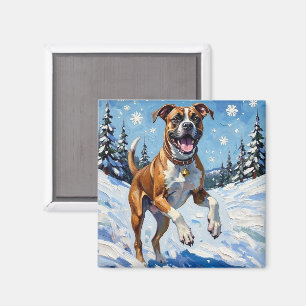Energischer Boxerhund springt im Winterschnee Spaß Magnet
