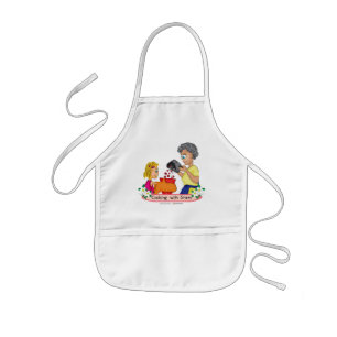 Enfant Cuisson avec le tablier de gramme