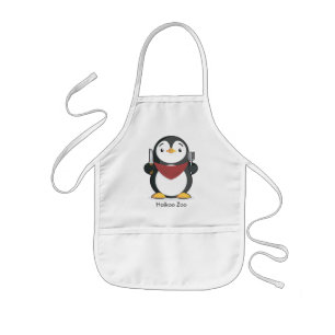 Enfant Le pingouin affamé badine le tablier