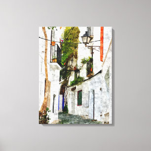 Enge Straße mit weißen Häusern in Cadaqués, Spanie Leinwanddruck
