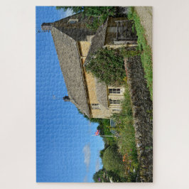 Englische Hütte mit Garten und Flagge