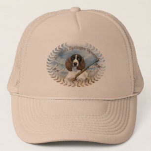 Englischer SpringerSpaniel jagt Hut Truckerkappe