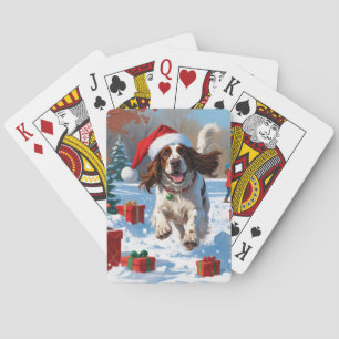 English Setter läuft im Schnee mit Weihnachtsmütze Spielkarten