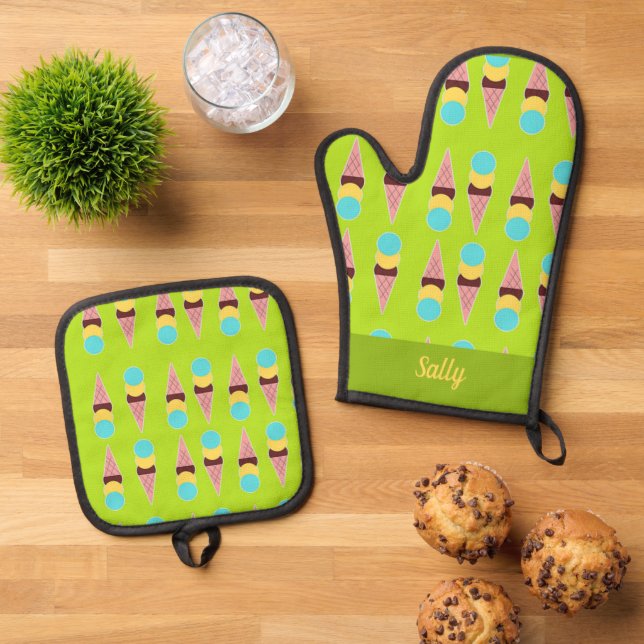 Ensemble De Gant De Cuisine Et De Manique Glaces colorées sur vert (De haut en bas)