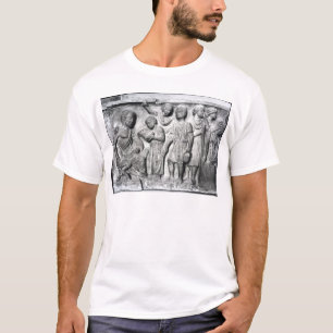 Entlastung, die einen Jungen liest zu seinem T-Shirt