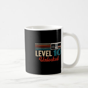 Entriegelter Videospielsteuerelement der Stufe 10 Kaffeetasse