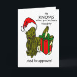 Er weiß, wann du eine unheilvolle Grußkarte warst Feiertagskarte<br><div class="desc">Ein zeichn des älteren Gottes Cthulhu,  der eine Weihnachtsmannmütze trägt und ein Geschenk mit den Worten hält: "Er weiß,  wann du ungezogen warst,  und er stimmt zu!". Weihnachtskarte</div>